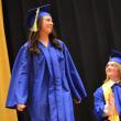 Sophie White heads to the podium to pick up one of her awards. KEVIN BURNHAM/Boothbay Register