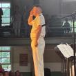 Conductor Chief Warrant Officer 2 John Page salutes the veterans in the audience by branch. LISA KRISTOFF/Boothbay Register