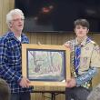 Former Scoutmaster Chris Roberts presents a Maurice Day print to Jeffrey McKinney, Eagle Scout, at the June 18 ceremony. Courtesy photo