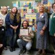 Andrew Slater, MMCA Child and Family Services Director, with MMCA staff and board members. Courtesy photo