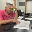 BHSD trustee Russell Hoffman reviews a map of the planned housing at Boothbay Harbor County Club. ISABELLE CURTIS/Boothbay Register