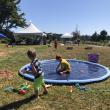 Children enjoying the splash pad at Field & Forest Family Fun Day. This free community event will take place on July 18 at Oak Point Farm. Courtesy of BRLT