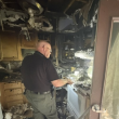 State Fire Marshal Ken MacMaster investigates the cause of a fire at the Campbell Apartments. Mark Sullivan photo