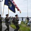Maine Marine Patrol Honor Guard completes a presentation of colors at the memorial.  ISABELLE CURTIS/Boothbay Register