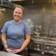 Shelby Mann, who participated in one of SEA's college programs, now helps students in the kitchen.  ISABELLE CURTIS/Boothbay Register