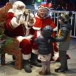 Santa and Mrs. Claus greet children on the Boothbay Common in 2025. File photo