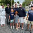 Winners of raffle and members of the VFW. Pictured from left, Megan Gill, Ed Harmon, Kiki, Brad Drummond, Brendan Gill, Justin Morgan; children, Emily and Liam. Courtesy of Jen Mitchell