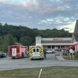 Firefighters and ambulance attendants at the scene of Friday's propane leak at the Meadow Mall. Mark Sullivan photo