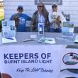 A few of the Keeper's of Burnt Island Light (KBIL) greeting and recruiting from left, Board President Doug Goldhirsch, Joann ? and Sharon Goldhirsch. LISA KRISTOFF/Boothbay Register