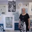 Suzanne Stokes with her installation of monoprints. Courtesy of SML