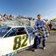 Chaz Briggs with the checkered flag. Jasen Dickey photo