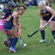 With Winthrop goalie Cyara Harriman nearby, freshman Emma Doucette (#28) and sophomore Lilly Cowing look to gain control of the ball in front of the goal in the first half. KEVIN BURNHAM/Boothbay Register