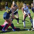 Olivia Hardwick, with the Hall-Dale goalie on the ground, pushes the ball into the open goal to give Boothbay a 2-1 lead in the second quarter of Thursday's game at home. KEVIN BURNHAM/Boothbay Register
