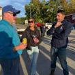 Business owners Dave Bean, left, talks with Kristin and Nick Page at the party. Courtesy photo