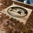 Boothbay Region High School Seahawks insignia in the penny bar. Courtesy of Jennie Plummer