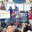 Members of CTL's Service Auxiliary Program accept a grant from Bangor Savings Bank to continue and strengthen the school's community service efforts. Courtesy of CTL
