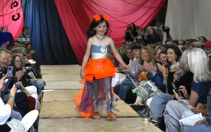 Harper Casey, 6, makes her runway debut in an outfit inspired by her father's lobster buoys.  ISABELLE CURTIS/Boothbay Register