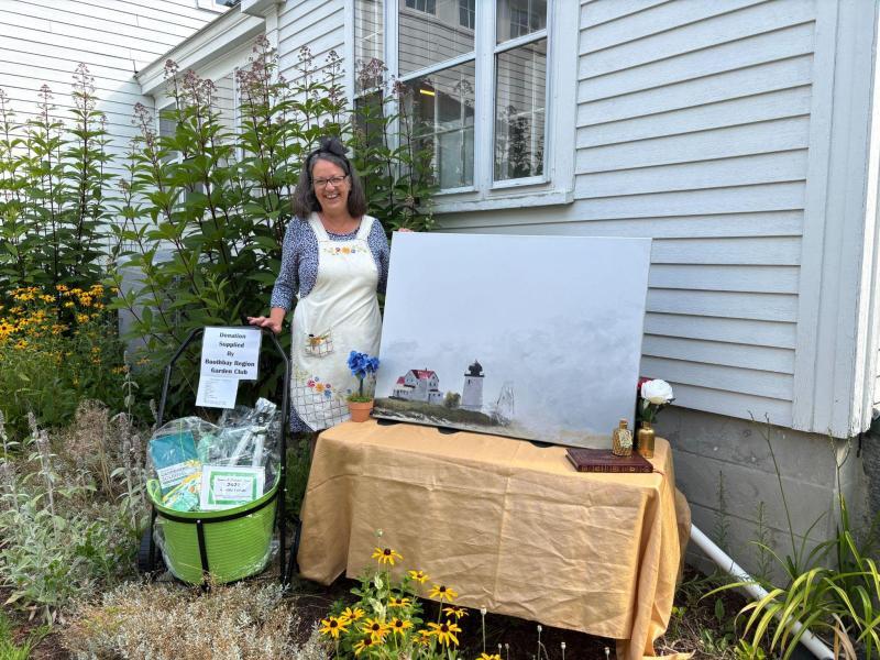 Circulation Coordinator Jane Wallace has the golden key to Wonderland (Aug. 2’s Storybook Ball) and wants you to bid on this Allen Bunker oil! Courtesy photo