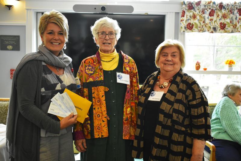 LincolnHealth President Cindy Wade accepts donations from St. Andrews' Auxiliary during their annual luncheon, pictured with auxiliary President Patty Colhoun and Vice President Sally Giantries. ISABELLE CURTIS/Boothbay Register
