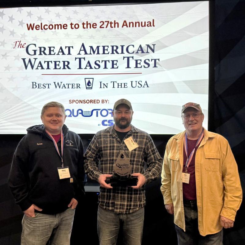 The Boothbay Region Water District makes a splash in Washington, D.C., winning bronze at the Great American Water Taste Test. Pictured: Aaron Durgan, General Manager Weston Alley and John Orne. Courtesy of the Maine Rural Water Association. 