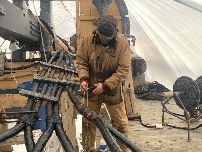 Jose Hernández-Juviel uses a marlinspike on refurbished rigging during a March 19 demonstration. ISABELLE CURTIS/Boothbay Register
