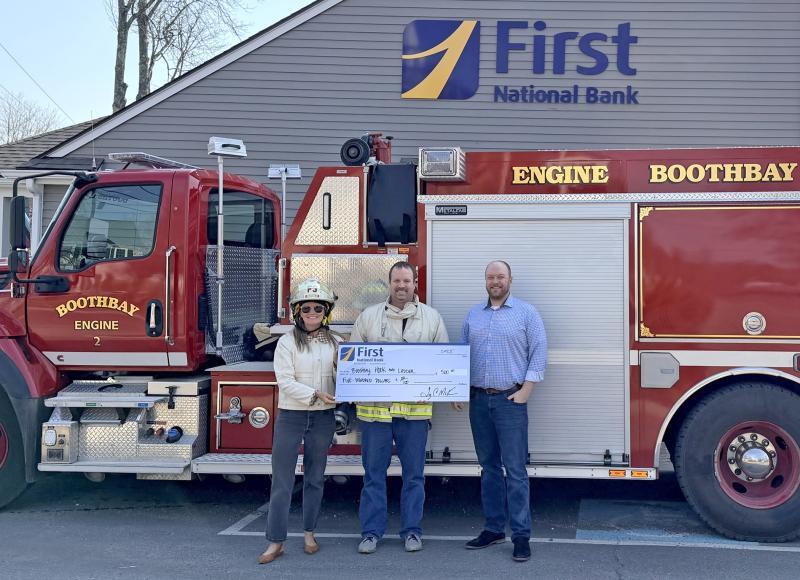 Alyssa Allen,  First National Bank Retention and Business Development Manager, Tim Pinkham, Chief, Boothbay Fire & Rescue, and Adam Climo, Bank Branch Manager. Courtesy photo
