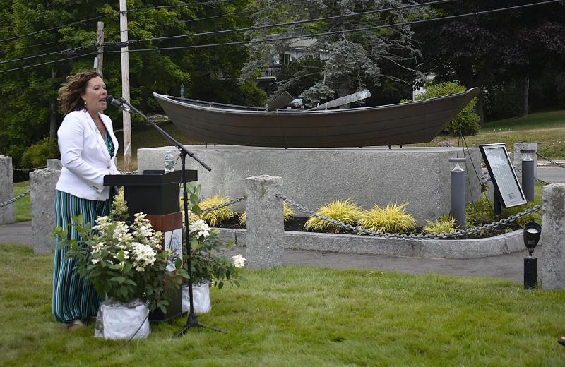 White and Green Hope Founder Liz Michaud opens ceremonies July 21st in Boothbay Harbor for Maine's first state Commercial Fishing Remembrance Day.  ISABELLE CURTIS/Boothbay Register