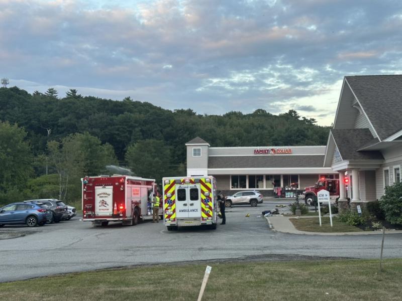 Firefighters and ambulance attendants at the scene of Friday's propane leak at the Meadow Mall. Mark Sullivan photo