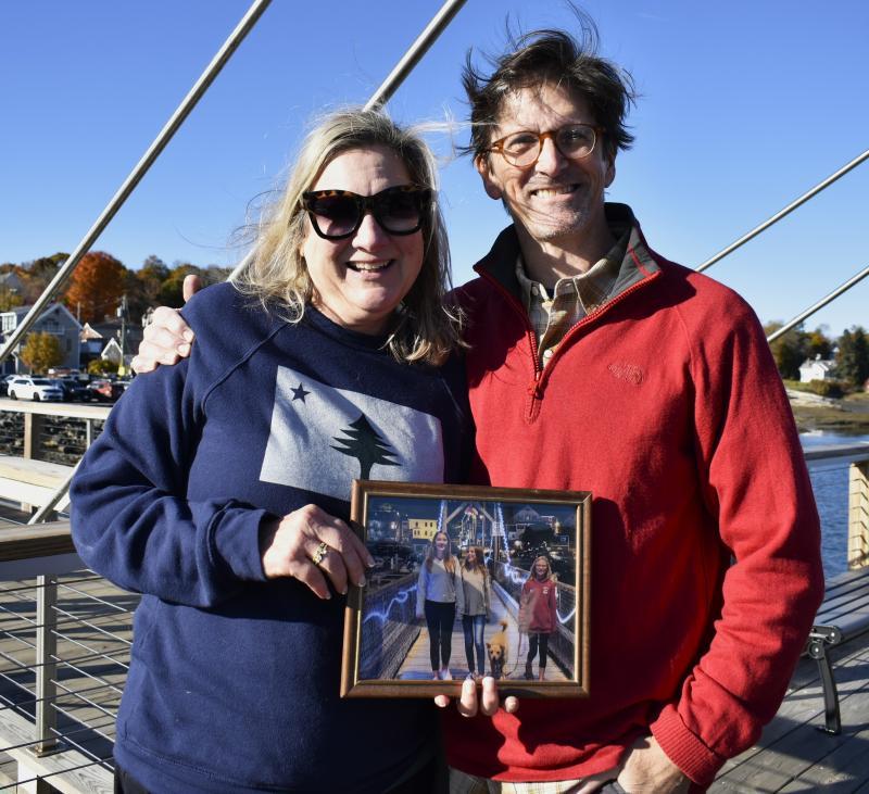 ennifer and Brian Bennhoff made it a tradition to take their three daughters, Mallory, Hadley and Delaney, and dog, Sparky, to the footbridge to commemorate each summer in Boothbay Harbor. Now full-time residents, the Bennoffs made sure to bring a family photo to the 125th anniversary celebration.  ISABELLE CURTIS/Boothbay Register