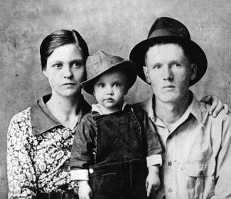 Elvis Presley and his parents.