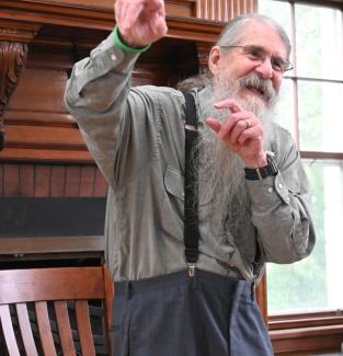 Bill Eberle, poet, interprets his poem