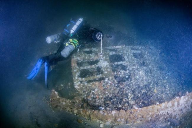 Diver Andrew Donn swims above one of Seiner's trawl doors. Courtesy of Joe Mazraani and Becca Boring