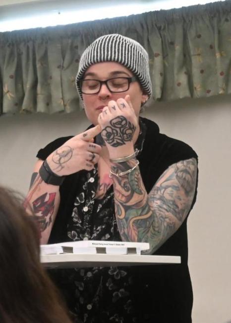 Poet reads their work.  Olivia FitzPatrick