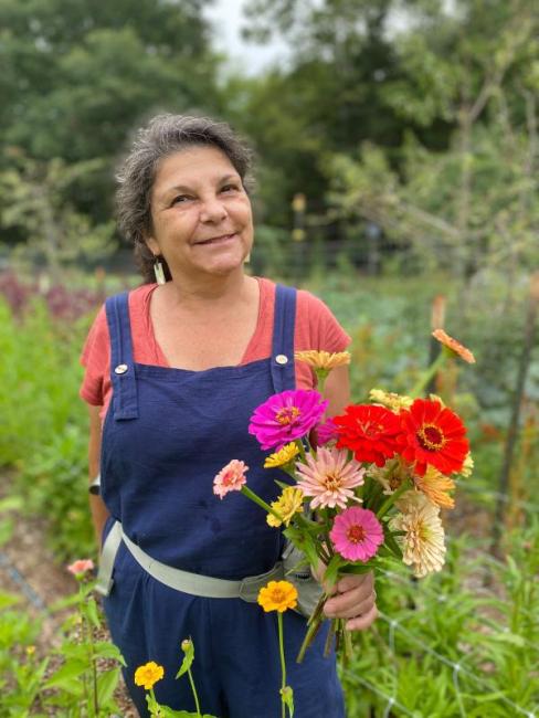  Designer Diane Farmer harvesting Veggies to Table flowers. Courtesy photo