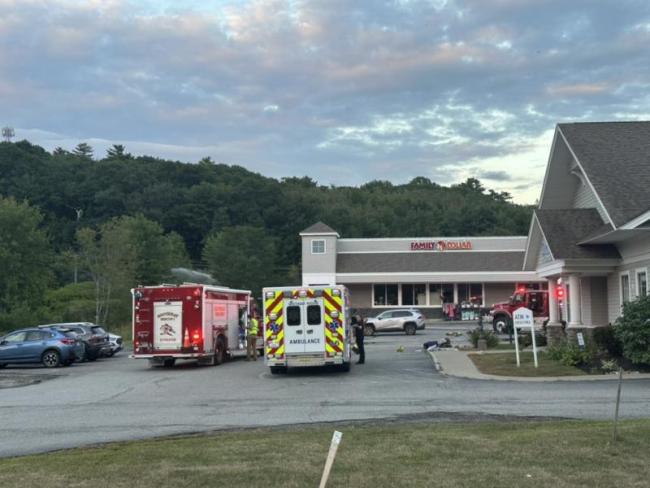 Firefighters and ambulance attendants at the scene of Friday's propane leak at the Meadow Mall. Mark Sullivan photo