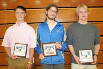 Boys tennis plaque winners, from left, Collin Thompson, Sam Schwehm and Brady Duncan