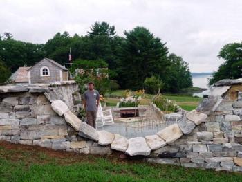 Master Stonemason Chris Tanguay in the sunken garden he created at the home of Louanna and Ted Frois on Westport Island the site of this year’s Champagne on the Sheepscot. Below, Sheepscot Valley Conservation Association staff and volunteers Kristin Pennock, Ann Springhorn, Honor Sage, Suki Flanagan, Carole Dunbar, Nancy Hartley, Callie Wronker and Beth Quivey prepare fundraiser invitations. Master Stonemason Chris Tanguay in the sunken garden he created at the home of Louanna and Ted Frois on Westport Island the site of this year’s Champagne on the Sheepscot.
