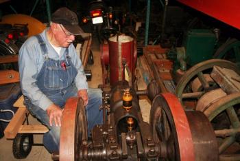 Robert Meixell, a collector of antique farm engines and co-founder of the Maine Antique Power Association, restores engines from his Westport Island homestead. Below, Meixell's workshop is a maze of antique engines once used to operate well pumps and other farm machinery. JOHN MAGUIRE/Wiscasset Newspaper JOHN MAGUIRE/Wiscasset Newspaper Robert Meixell, a collector of antique farm engines and co-founder of the Maine Antique Power Association, restores engines from his Westport Island homestead. JOHN MAGUIRE/Wiscasset Newspaper
