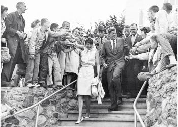 President John F. Kennedy and his sister, Patricia Kennedy Lawford, thronged by well-wishers as he leaves the 10 a.m. Sunday mass at Our Lady Queen of Peace in Boothbay Harbor on Aug. 12, 1962. Kennedy was the first president to visit Boothbay Harbor. Courtesy of Tom Carbone Archives President John F. Kennedy and his sister, Patricia Kennedy Lawford, thronged by well-wishers as he leaves the 10 a.m. Sunday mass at Our Lady Queen of Peace in Boothbay Harbor on Aug. 12, 1962. Courtesy of Tom Carbone Archives