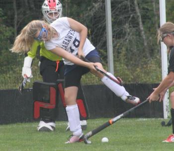 Samantha Carter clears the ball in front of goalie Madison McCarthy during Friday's game at home against Lisbon. KEVIN BURNHAM/Boothbay Register Samantha Carter clears the ball in front of goalie Madison McCarthy during Friday's game at home against Lisbon. KEVIN BURNHAM/Boothbay Register