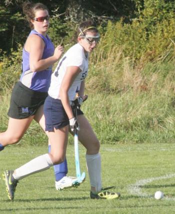 Shaw Pinkham dribbles past a Mountain Valley player during Tuesday's home game. KEVIN BURNHAM/Boothbay Register