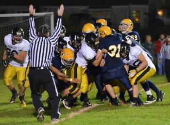 Kameron Markee scores on a one-yard run to give Boothbay a brief lead in the second quarter. Courtesy of Aquilino Alamo