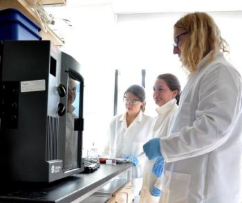 From left: Marianne Ferguson, Grace Reville and Dr. Jochen Nuester wait on an experiment at Bigelow Laboratories on Nov. 8. Reville and Ferguson, along with two other students from Colby College, have been at Bigelow for the fall semester.BEN BULKELEY/Boothbay Register