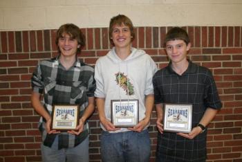 Boys' Cross-Country plaque winners, from left, Alex Owen, most valuable; Kade Smith, coaches award; Kyle Carty, most improved. KEVIN BURNHAM/Boothbay Register Boys' Cross-Country plaque winners, from left, Alex Owen, most valuable; Kade Smith, coaches award; Kyle Carty, most improved. KEVIN BURNHAM/Boothbay Register