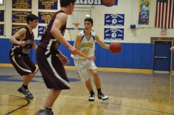 Joseph DiMauro, right, picks his spot against Monmouth. The younger DiMauro finished with 4 points. BEN BULKELEY/Boothbay Register