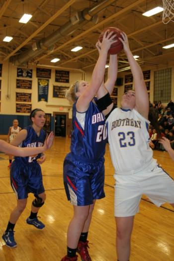 Allison Crocker battles Oak Hill's Brianna Hodgkins for a second half rebound. KEVIN BURNHAM/Boothbay Register