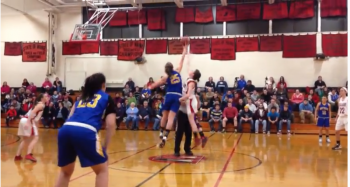 Alex Clarke tips off against Wiscasset's center. Boothbay beat their rivals 55-28, January 7. Below: Allison Crocker, Alex Clarke, and Sarah Caron make up Boothbay's core leadership. RYAN LEIGHTON/Boothbay Register Alex Clarke tips off against Wiscasset's center. Boothbay beat their rivals 55-28, January 7