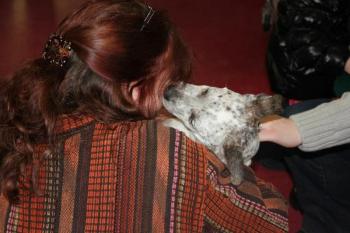 Sprinkles gives Nancy Pederson a kiss
