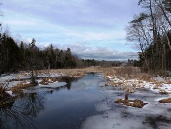 The view off the Penny Lake Land Bridge.With the weather warming up, much of the ice has already melted, but large patches remain on the banksides. KATRINA CLARK/Boothbay Register