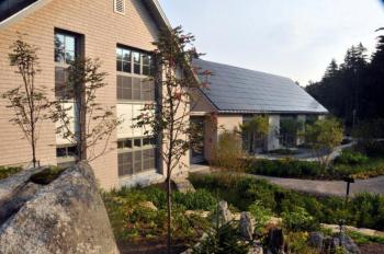 The Bosarge Family Education Center at Coastal Maine Botanical Gardens serves many purposes. Photovoltaic panels on the classroom wing help the building create more energy than it uses. Courtesy of William Cullina